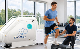 Sports rehab clinic with therapist and athlete